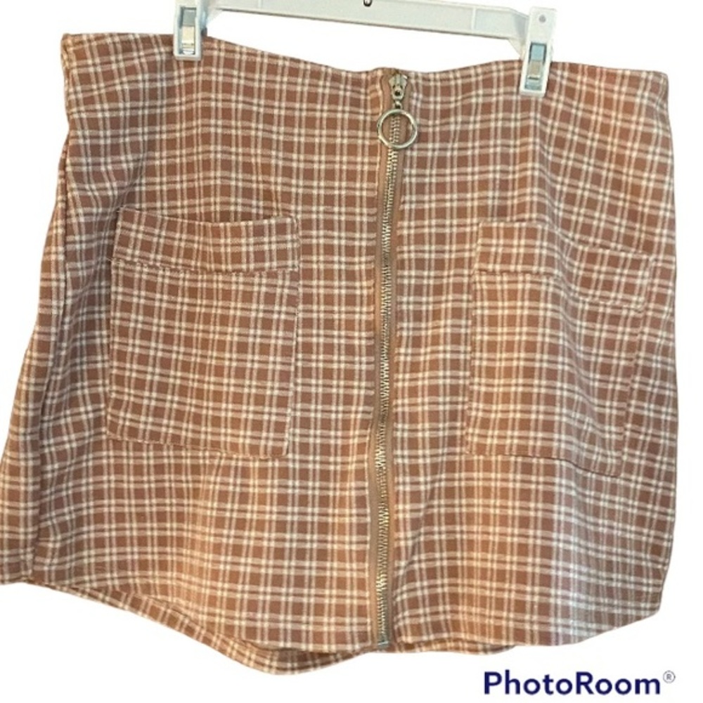 KTK plaid skort.  Size large,‎ guessing juniors.